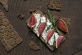 Small loaf of bread with cake cheese, figs and rosemary Royalty Free Stock Photo