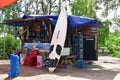 Small local open shop on the beach with large choice of items from Surfboard to rent to clothes and drinks. Small business backgro