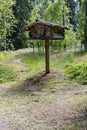 Small log cabin on top of a tall pole Royalty Free Stock Photo