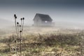 Small lonely provincial house on a foggy morning near Sic villa