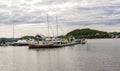 A small marina bay with several boats berthed near Sokn camping site