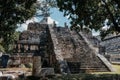 Small mayan pyramid in the forest, Chichen Itza archaeological site Royalty Free Stock Photo