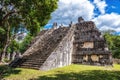 Small mayan pyramid in the forest, Chichen Itza archaeological site Royalty Free Stock Photo
