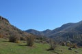 Small meadow on the way to the peak of the mountain Royalty Free Stock Photo