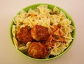 Small meat balls with peas and farfalle Royalty Free Stock Photo