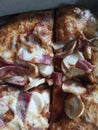 Small meat and sausage pizza, delicious and delicious