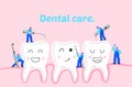 Small men treat, clean big teeth dental insturment. Dentistry work concept. Dental care Royalty Free Stock Photo