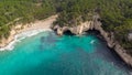 Small Menorca beach on a sunny day. Turquoise water