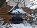 Birdhouse of metal in his front yard in Storkow in Germany