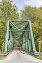 Small metal bridge spanning rock river in Williamsville, Vermont