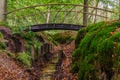 Small metal bridge in woods Royalty Free Stock Photo