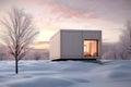 a small, minimalist cube house situated in a snowy landscape