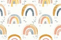 Small, minimalist rainbows in muted tones, repeated in a cute pattern on a white background Royalty Free Stock Photo
