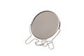 Small mirror in metal frame on a white background Royalty Free Stock Photo