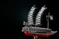 A model of famous ancient Korean ironclad war ship. Korean turtle ship on a black background. Black and white and red Royalty Free Stock Photo