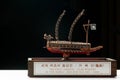 A model of famous ancient Korean ironclad war ship. Korean turtle ship on a black background Royalty Free Stock Photo