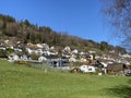 A small modern Swiss settlement or village Egolzwil on the slopes of the hill Egozwilerberg - Canton of Lucerne, Switzerland