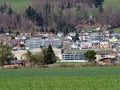 A small modern Swiss settlement or village Wauwil on the slopes of the hill Egozwilerberg - Canton of Lucerne, Switzerland