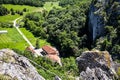 Small monastery Vratna in Serbia under the big stone