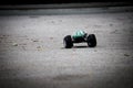 Small monstertruck remote control car turning on the street Royalty Free Stock Photo