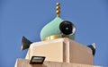 Soft Green Onion Dome with Gold Accents with Speakers for Call to Prayer