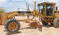 A small motor grader with GPS guidance system