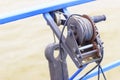 A small motor ship carries a mechanical winch on board Royalty Free Stock Photo