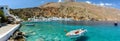 Small motorboat at clear water bay of Loutro town on Crete island, Greece Royalty Free Stock Photo