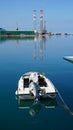 Small motorboat moored in the harbor of Croatian town