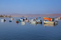 Small motorboats anchored in Paracas Bay, Peru