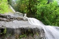 Small mountain creek with waterfall at the Abkhazian forest, Kodori gorge Royalty Free Stock Photo