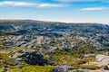 Small mountain lake, mirror water, amazing landscape, stone beach, forest Royalty Free Stock Photo