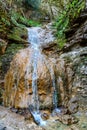 Small mountain waterfall on the rocks Royalty Free Stock Photo