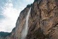 Small mountain waterfall. Summer alpine mountain landscape. Royalty Free Stock Photo