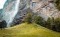 Small mountain waterfall. Summer alpine mountain landscape. Famous valley of waterfalls in Lauterbrunnen Royalty Free Stock Photo