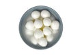 Small mozzarella cheese balls in ceramic bowl isolated on white background Royalty Free Stock Photo