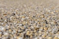 Small multicolored pebbles, road rubble, selective focus.