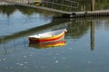 Small multicoloured boat on sea Royalty Free Stock Photo