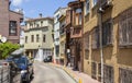 Narrow cozy street with historic houses in old town of Istanbul, Turkey Royalty Free Stock Photo