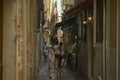 A small and narrow Italian street.