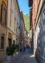 Small narrow pedestrian street in Como, Italy