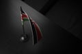 Small national flag of the Kenya on a black background