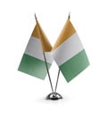 Small national flags of the Cote dIvoire on a white background