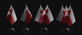 Small national flags of the Greenland on a black background