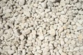 Naturally polished white rock pebbles background Royalty Free Stock Photo