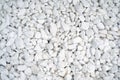 Small naturally polished white rock pebbles background Royalty Free Stock Photo