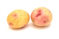 Small new potatoes with pink coloration isolated on white Royalty Free Stock Photo