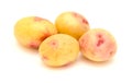 Small new potatoes with pink coloration isolated on white Royalty Free Stock Photo