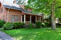 Small nice brick house with columns in a village near the atlantic ocean