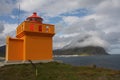 A small nice orange lighthouse